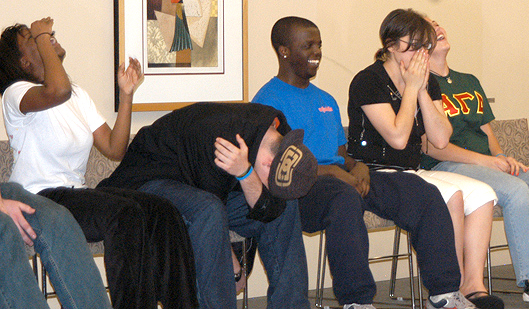 college-hypnotist-laughing-students
